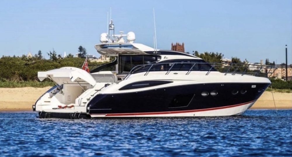 2014 Princess V62-S at anchor off the beach